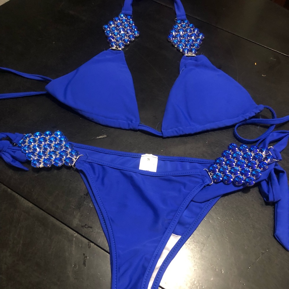 Cute ladies blue bikini with gems on the side and on top